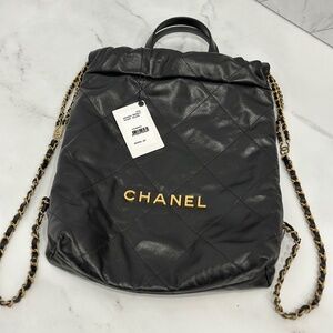 CHANEL Chanel Black Shiny Quilted Leather 22 Backpack